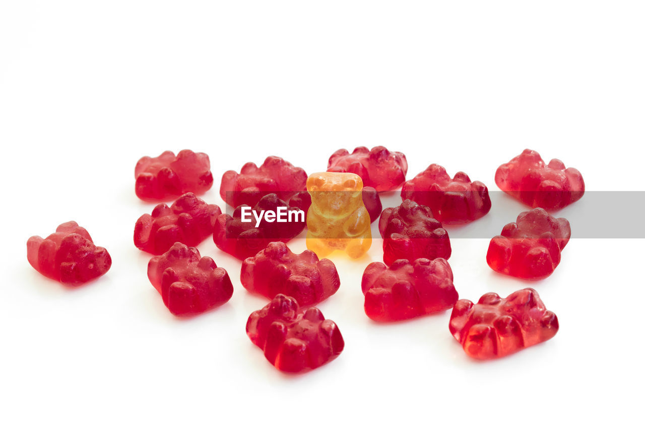 Close-up of gummi bears against white background