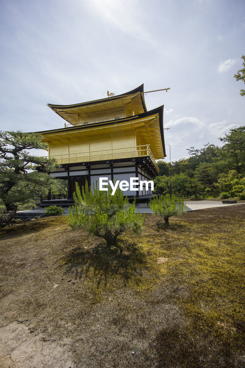 VIEW OF TEMPLE AGAINST BUILDING