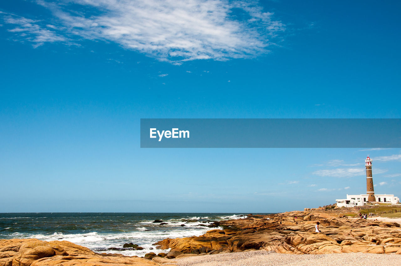 Scenic view of sea against blue sky