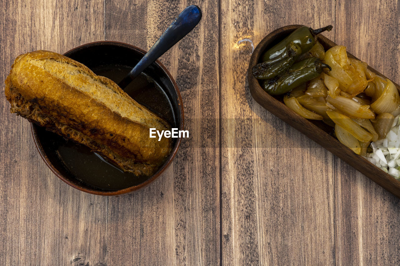 food and drink, food, wood, produce, freshness, kitchen utensil, healthy eating, indoors, table, eating utensil, no people, fast food, wellbeing, still life, high angle view, directly above, vegetable, spoon, studio shot, yellow, household equipment