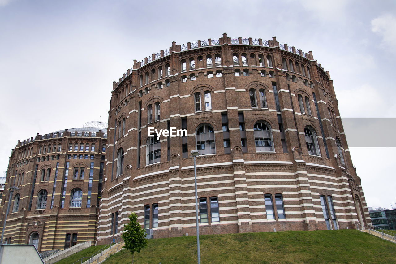 architecture, landmark, built structure, building exterior, history, travel destinations, sky, the past, building, travel, nature, tourism, city, low angle view, cloud, estate, facade, outdoors, château, no people, tower, day, palace, business finance and industry, ancient