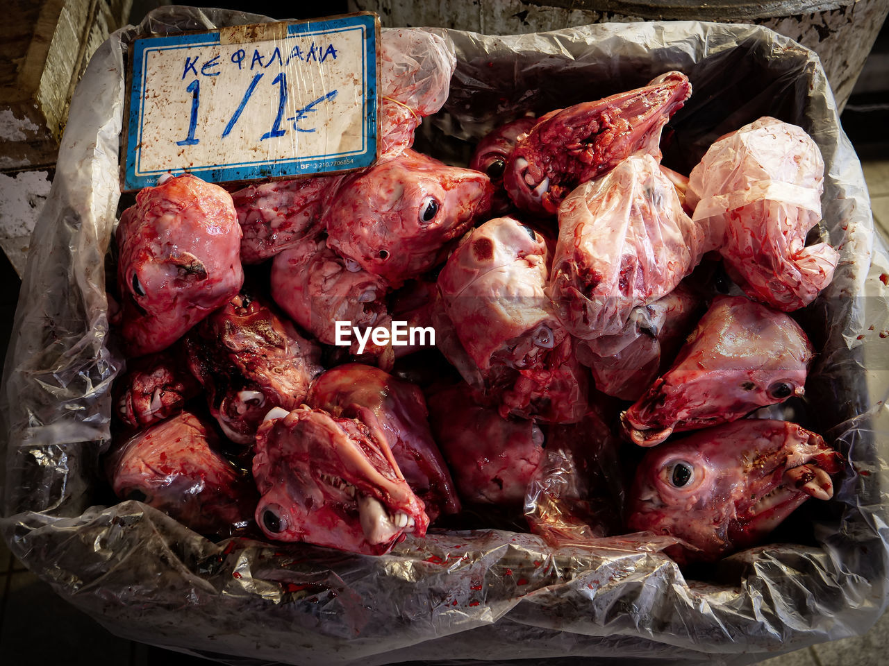 High angle view of goat heads for sale in market