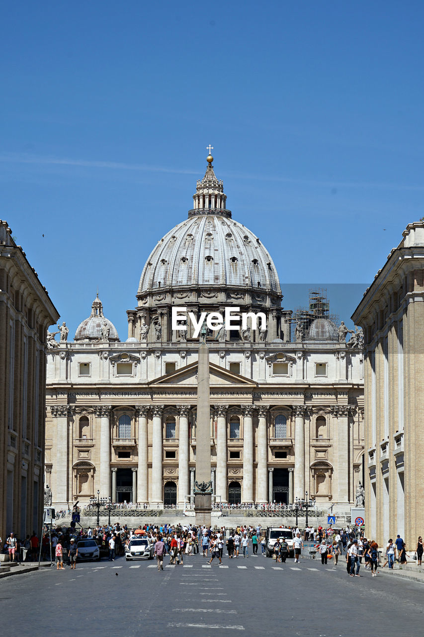 Facade of st peter basilica against blue sky