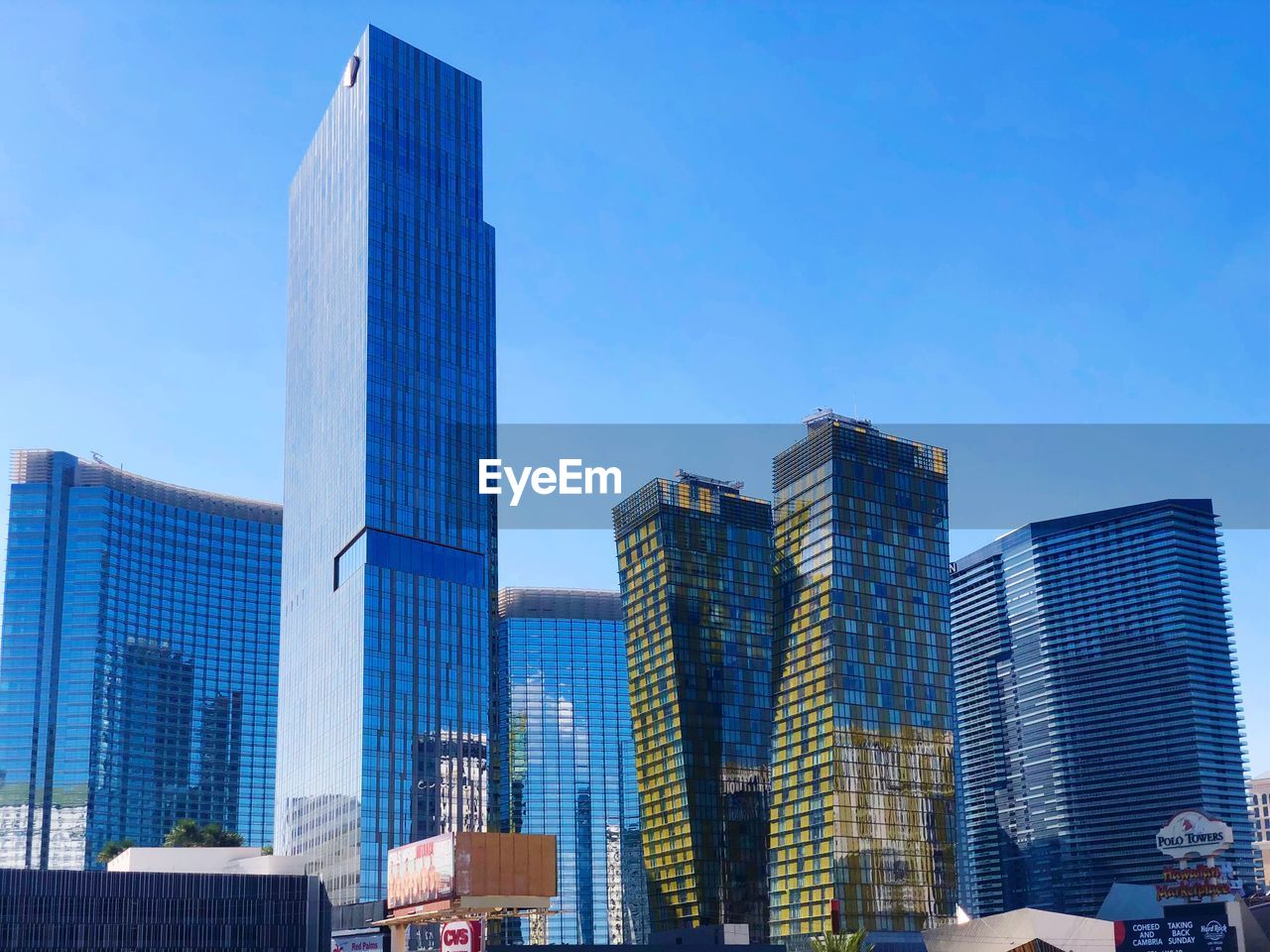 Modern buildings against blue sky