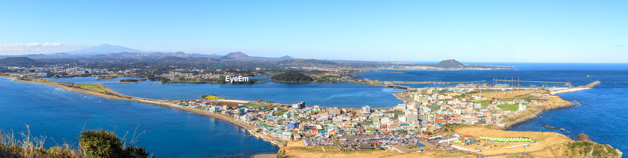 High angle view of sea against blue sky