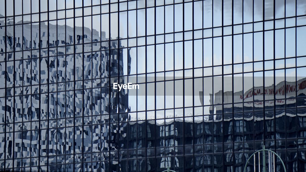 MODERN BUILDINGS AGAINST SKY