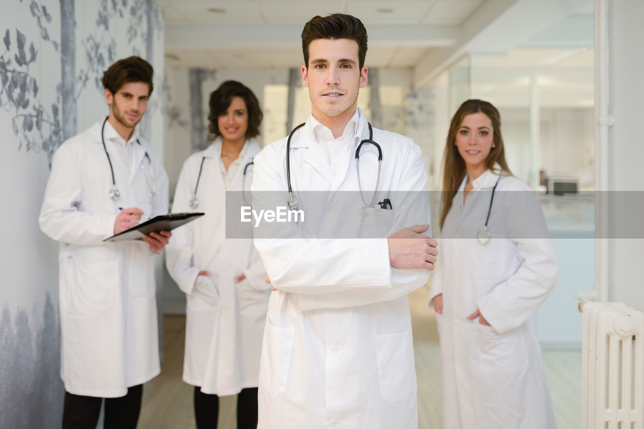 Portrait of doctors standing in hospital