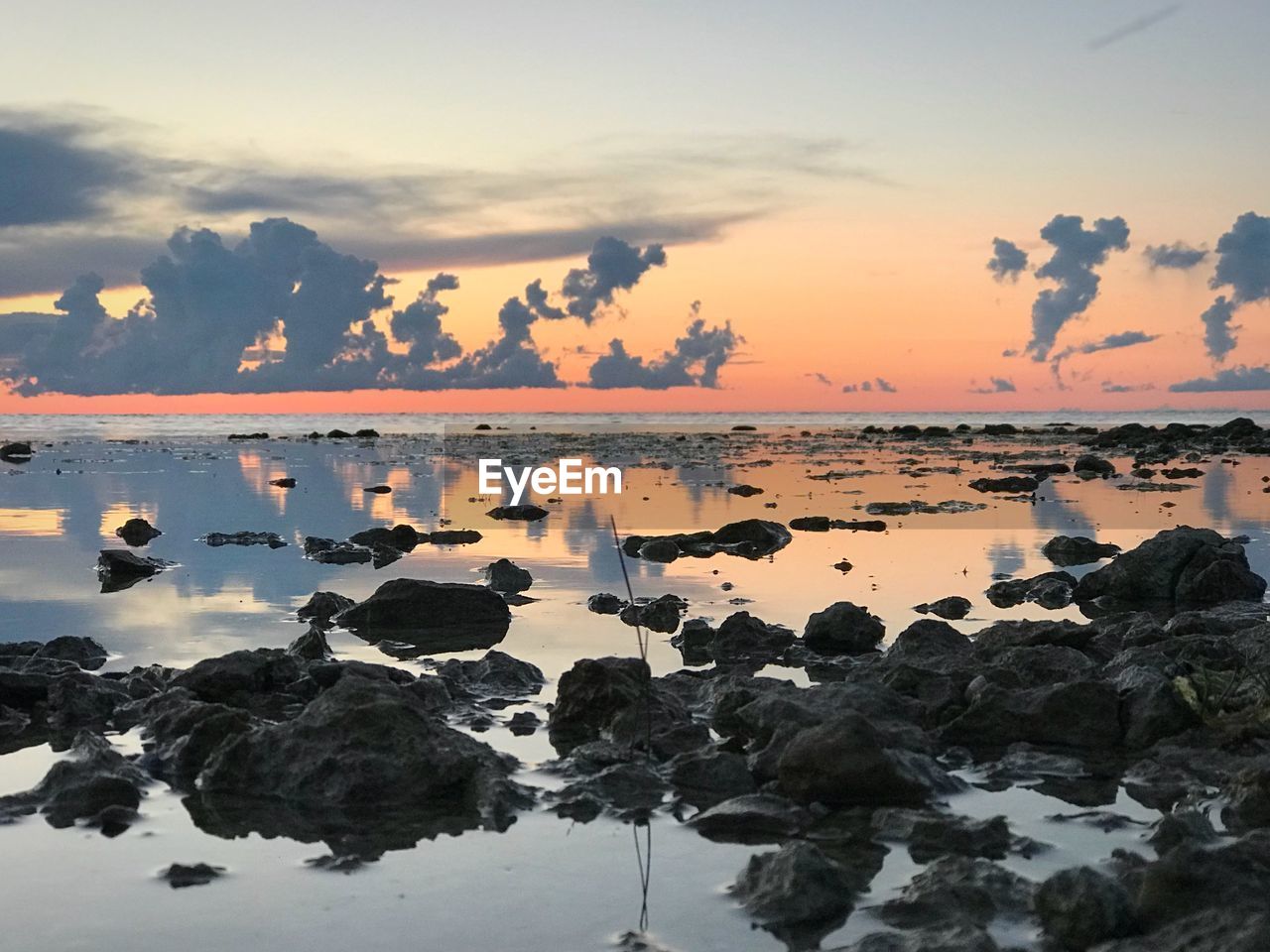 Scenic view of sea against sky during sunset