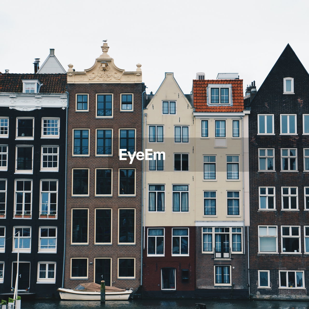 View of apartment buildings on amsterdam canal