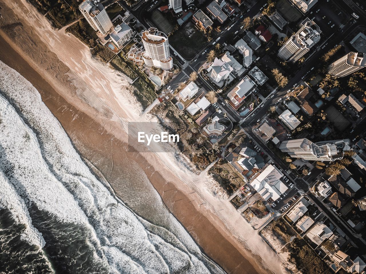 Aerial view of sea and cityscape