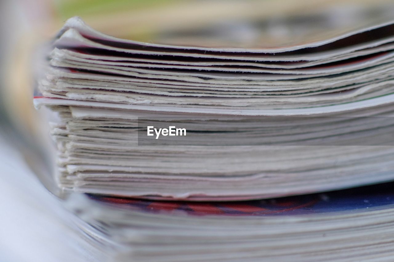 Close-up of stacked papers