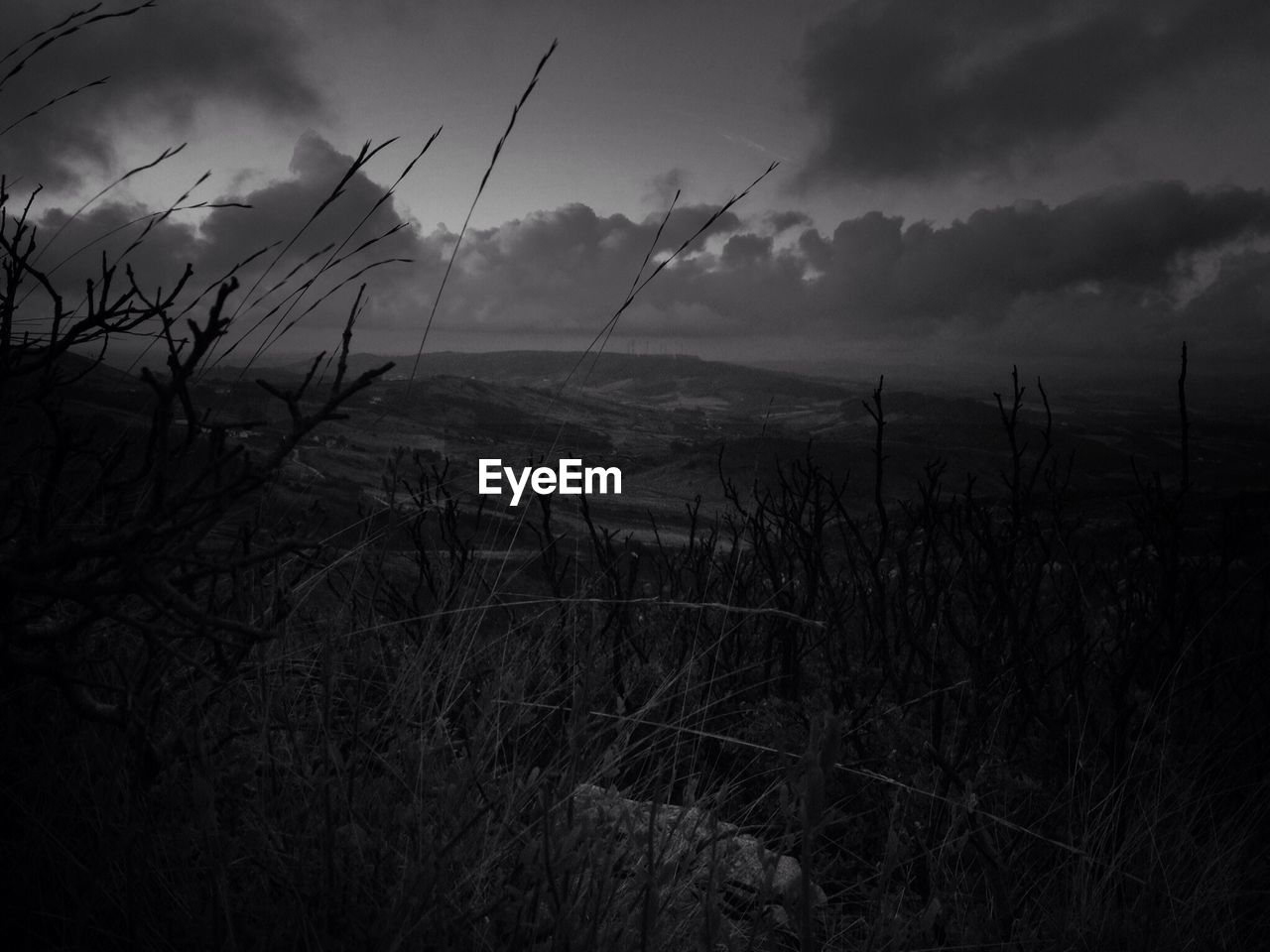 VIEW OF LANDSCAPE AGAINST CLOUDY SKY