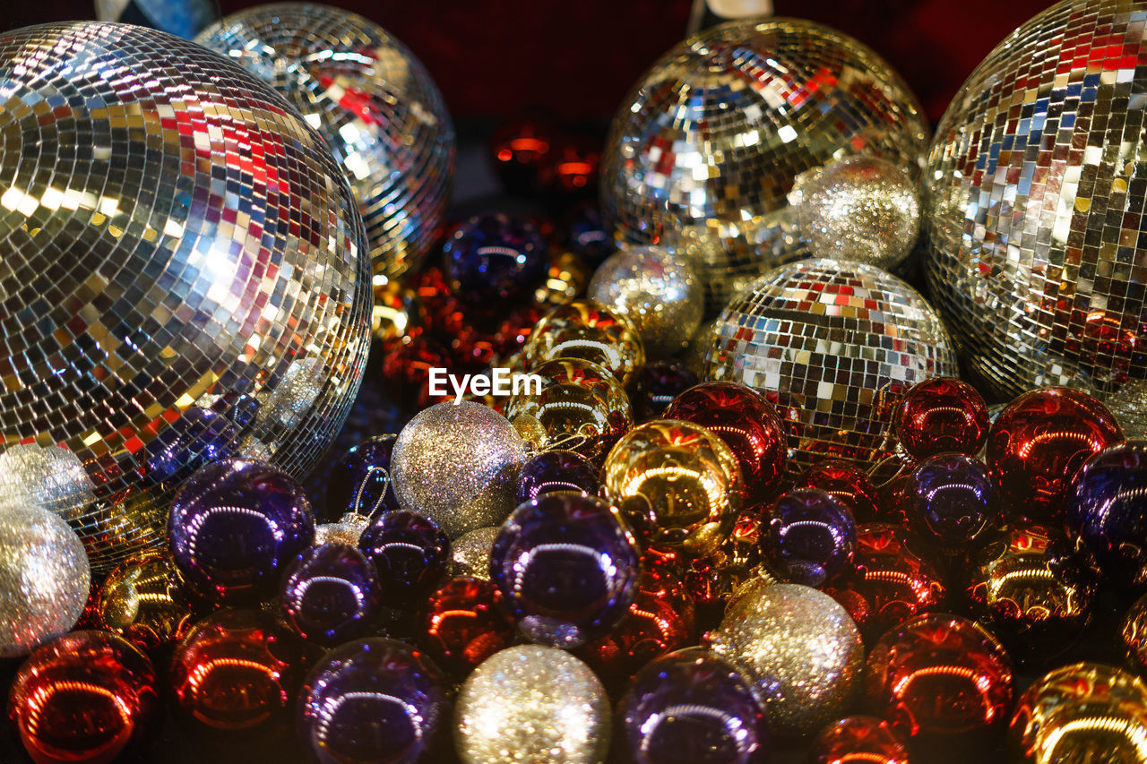 Close-up of christmas baubles and disco balls