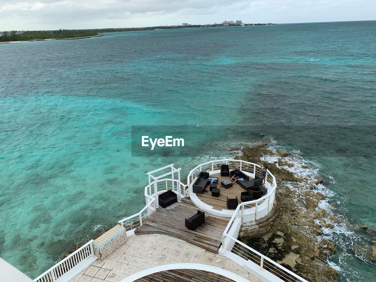 HIGH ANGLE VIEW OF SHIP ON SEA AGAINST SKY