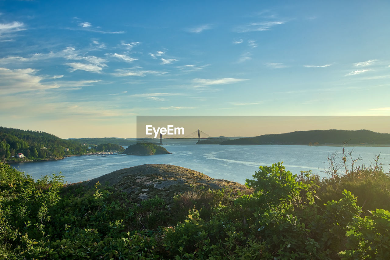 Scenic view of bay against sky