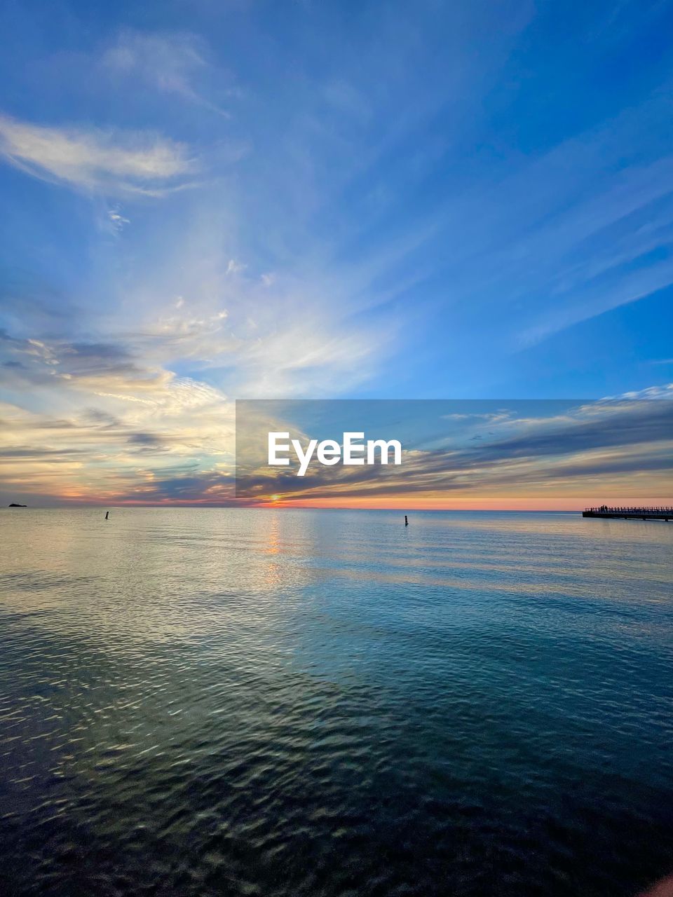 SCENIC VIEW OF SEA AGAINST BLUE SKY