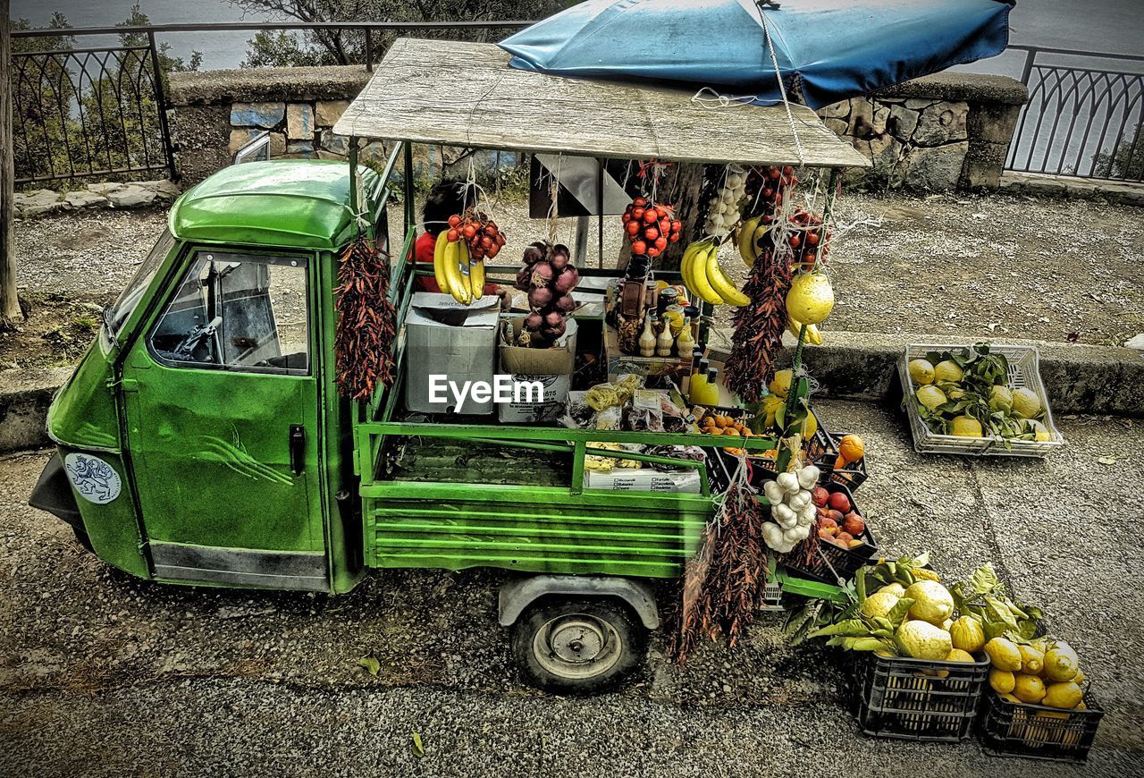 High angle view of fruits for sale on pick-up truck