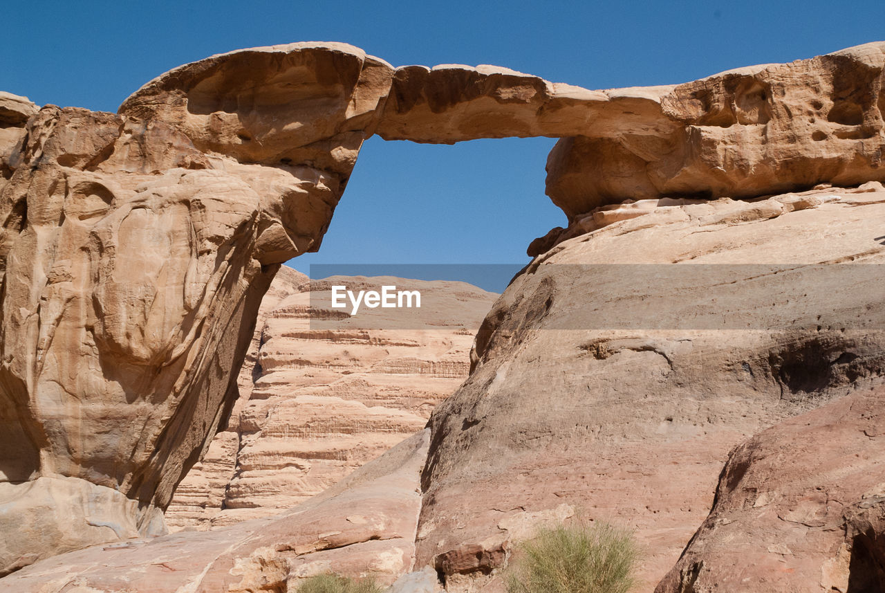 Jebel burdah rock bridge in wadi rum in jordan