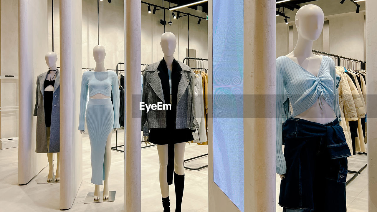 low section of woman standing in store