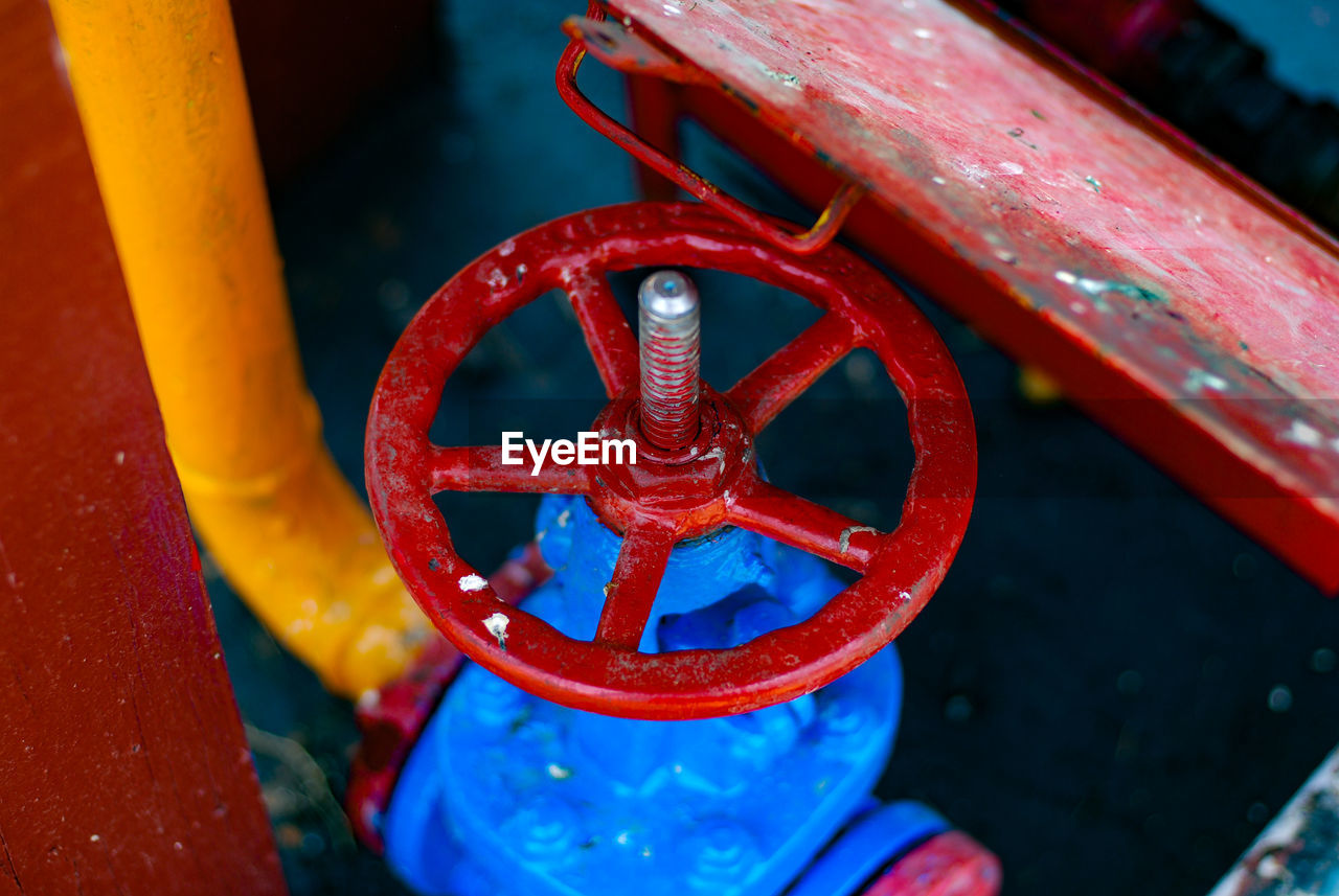 High angle view of red wheel in water