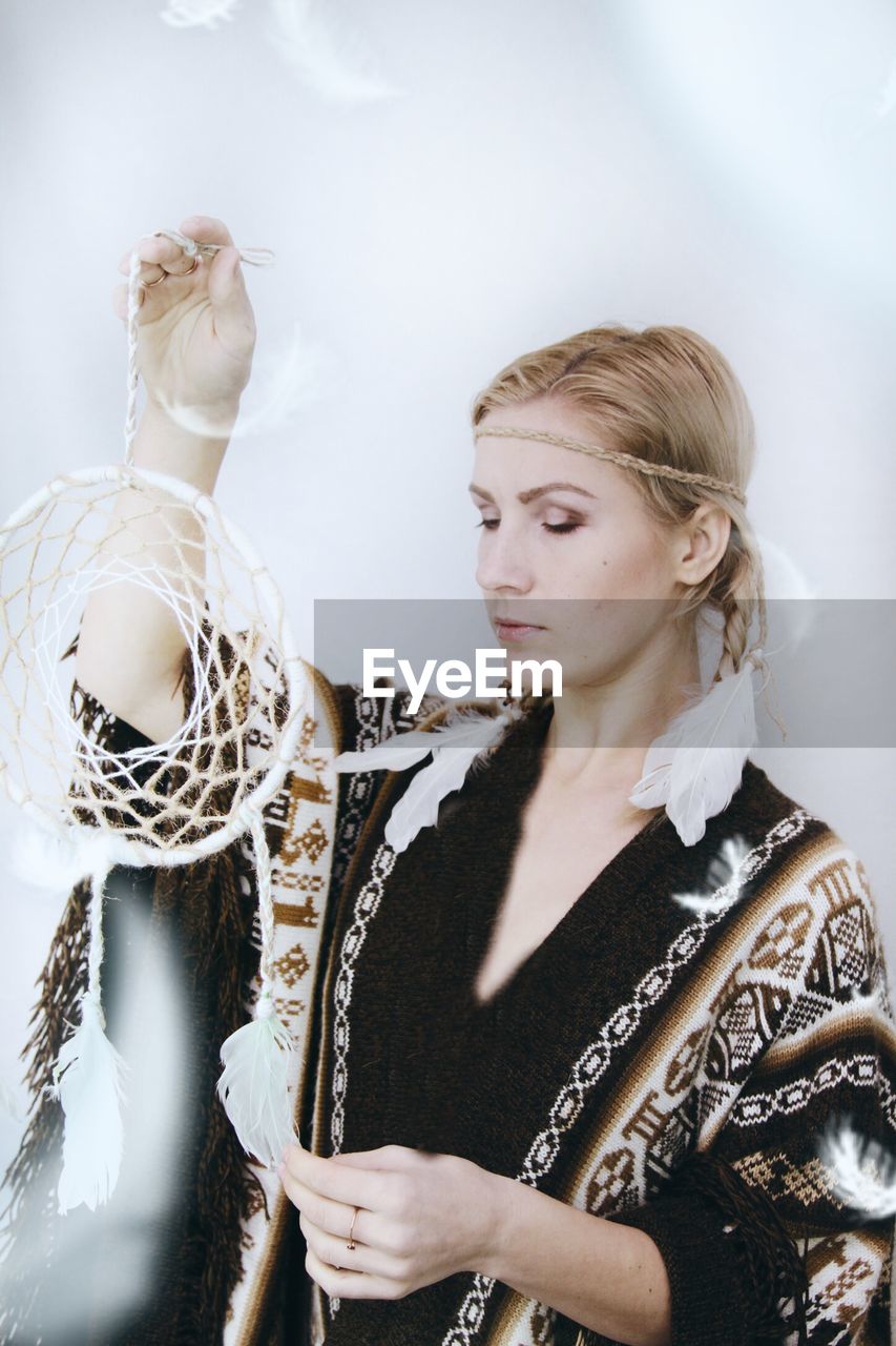 Young woman with dreamcatcher