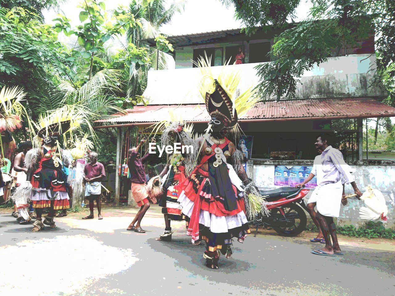 PEOPLE PLAYING WITH UMBRELLA