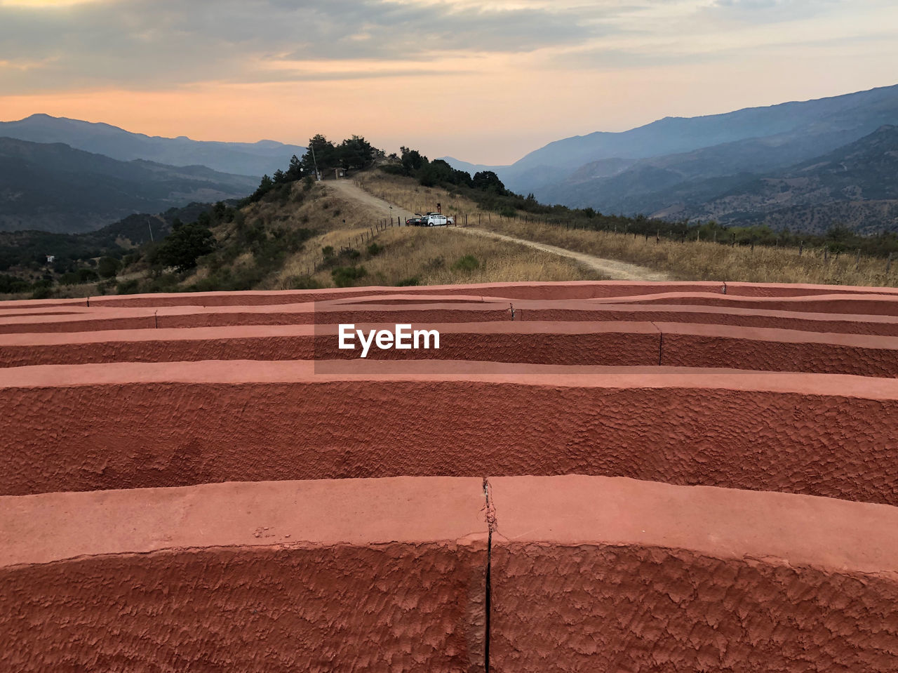 Scenic view of landscape against sky during sunset