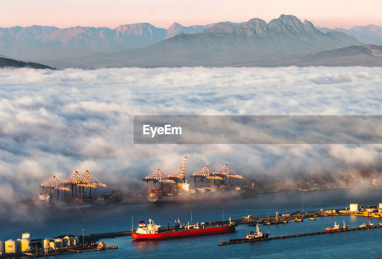 High angle view of harbour at sunset