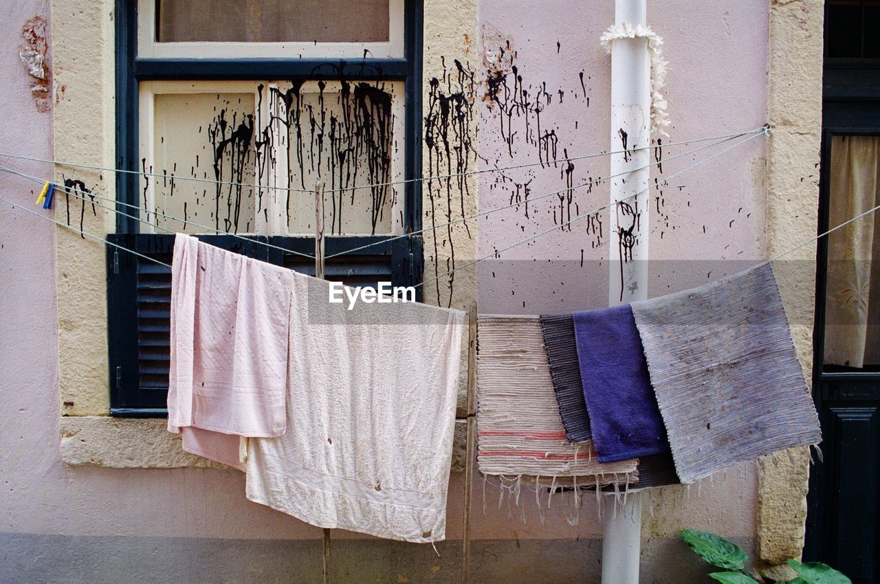 Clothes drying against building