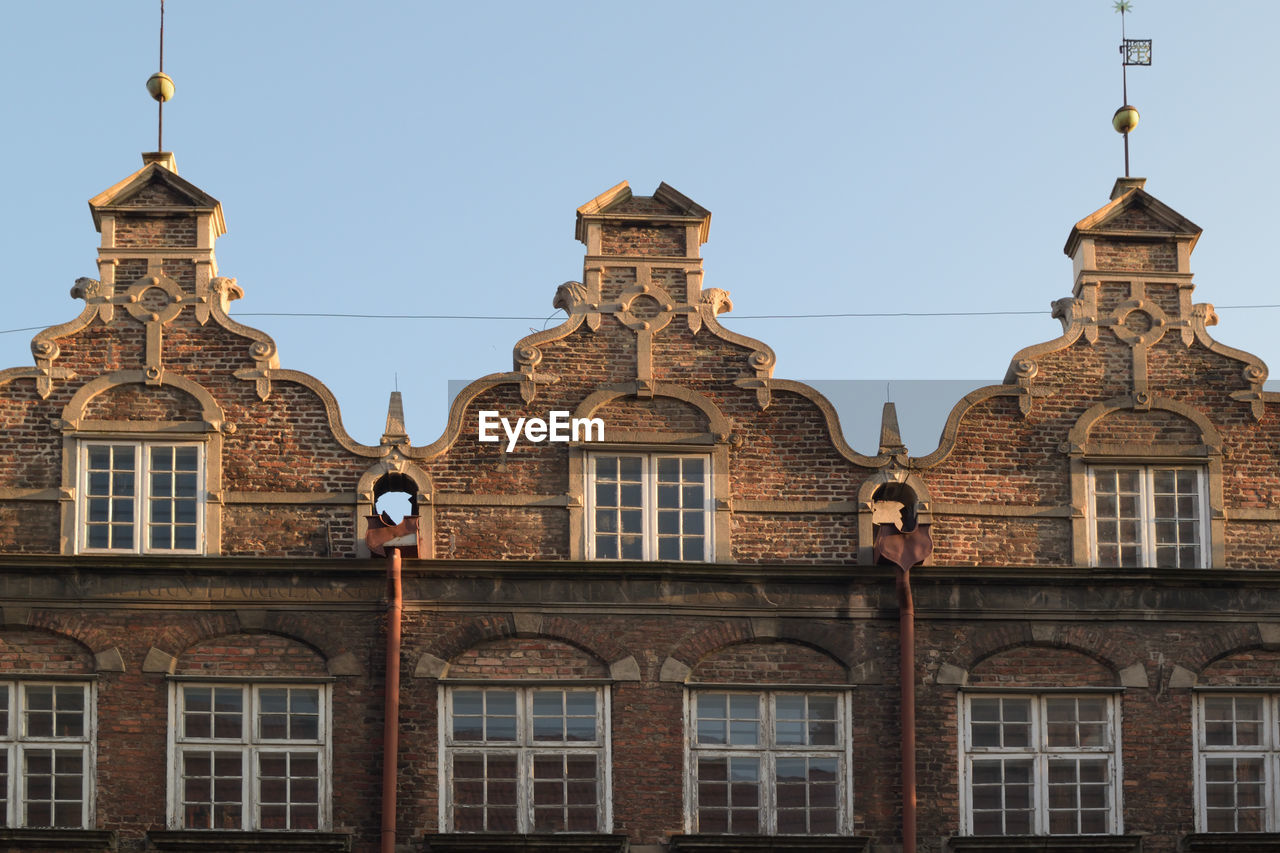 Low angle view of building against clear sky