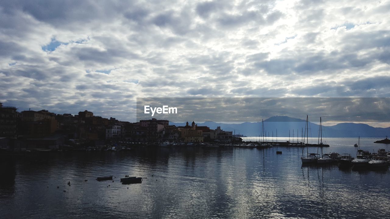 SCENIC VIEW OF BAY AGAINST SKY