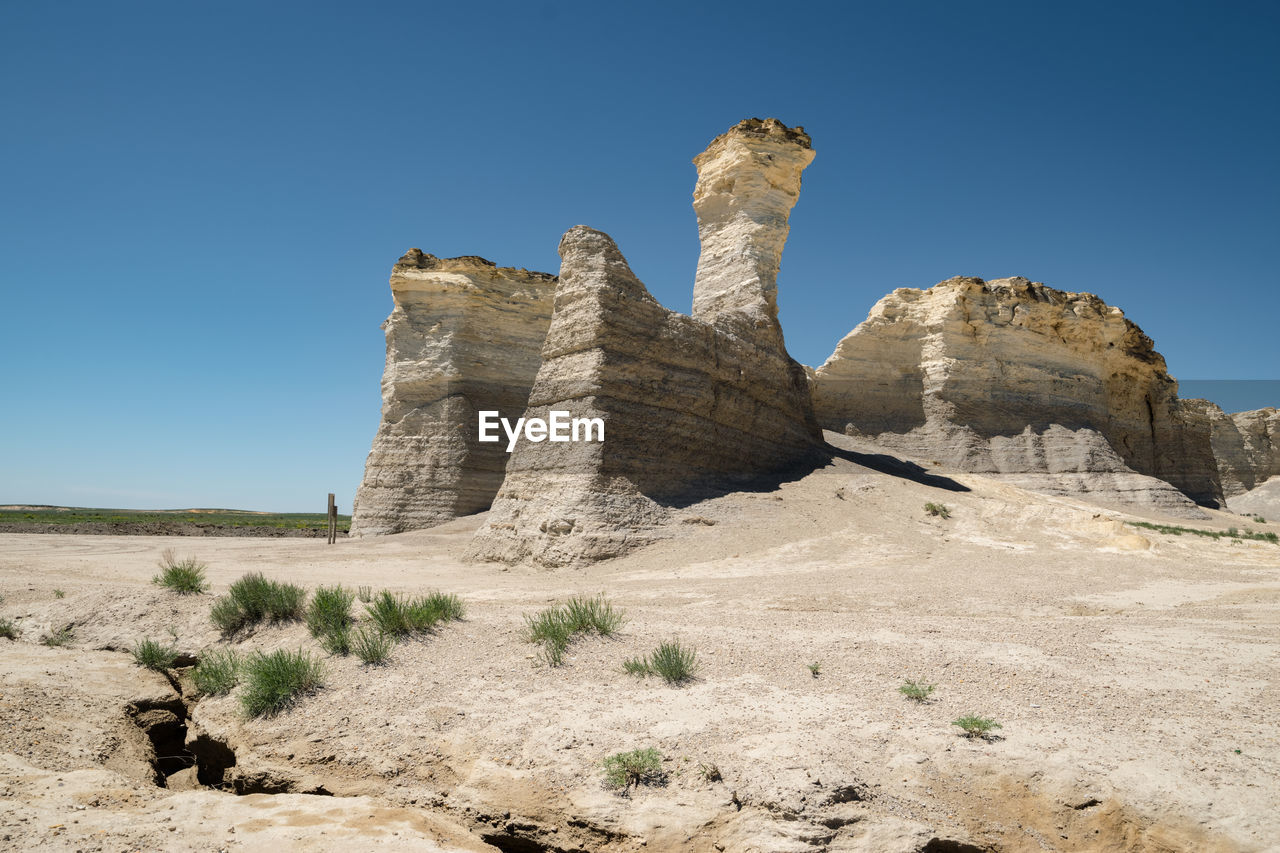 Large chalk formations called monument rocks in kansas, usa