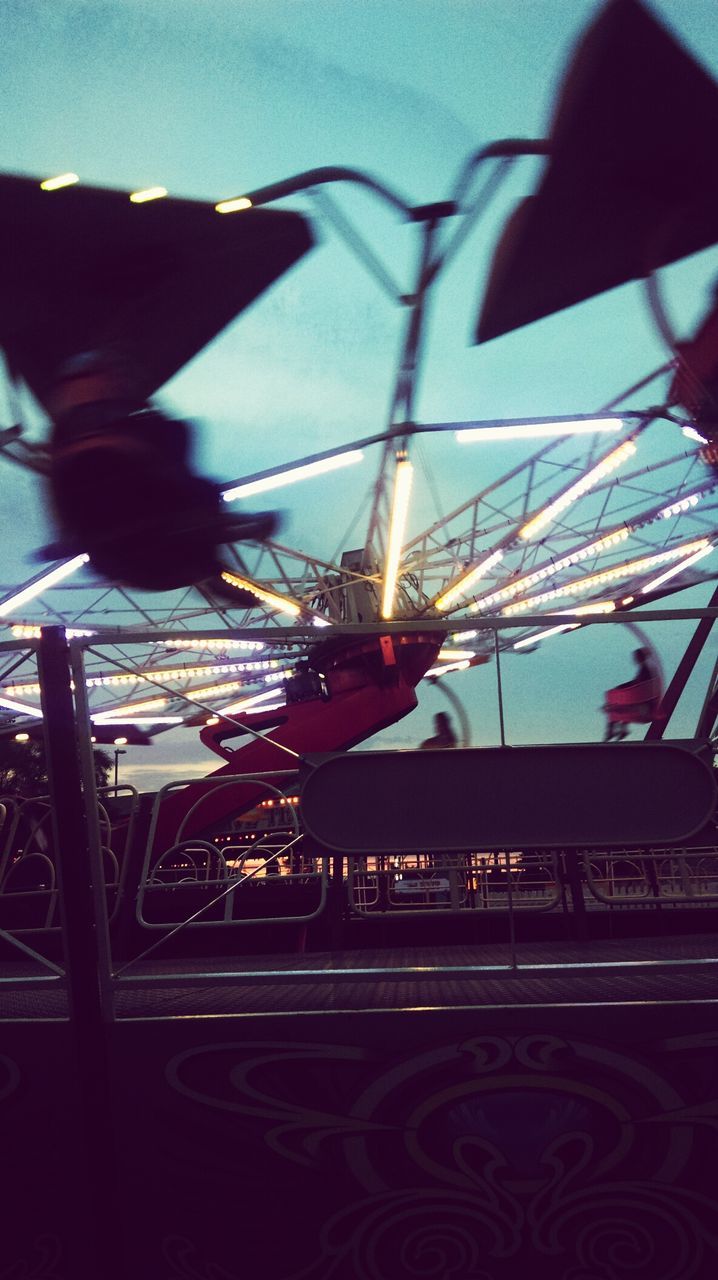 LOW ANGLE VIEW OF ILLUMINATED FERRIS WHEEL