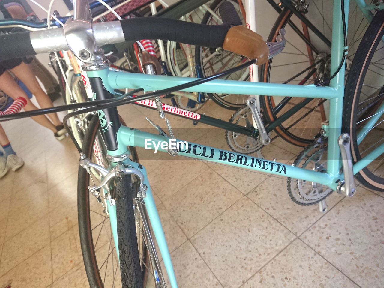 HIGH ANGLE VIEW OF BICYCLE ON FOOTPATH