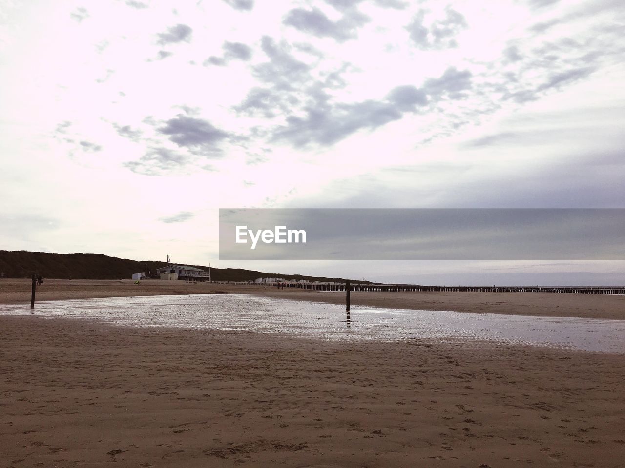 VIEW OF SEA AGAINST CLOUDY SKY