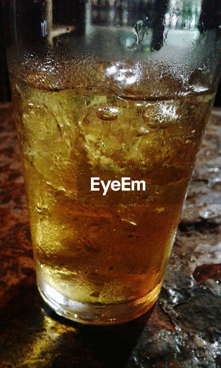 High angle view of alcohol in drinking glass on table