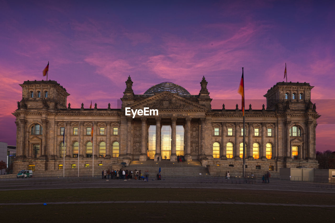 View of historic building at dusk