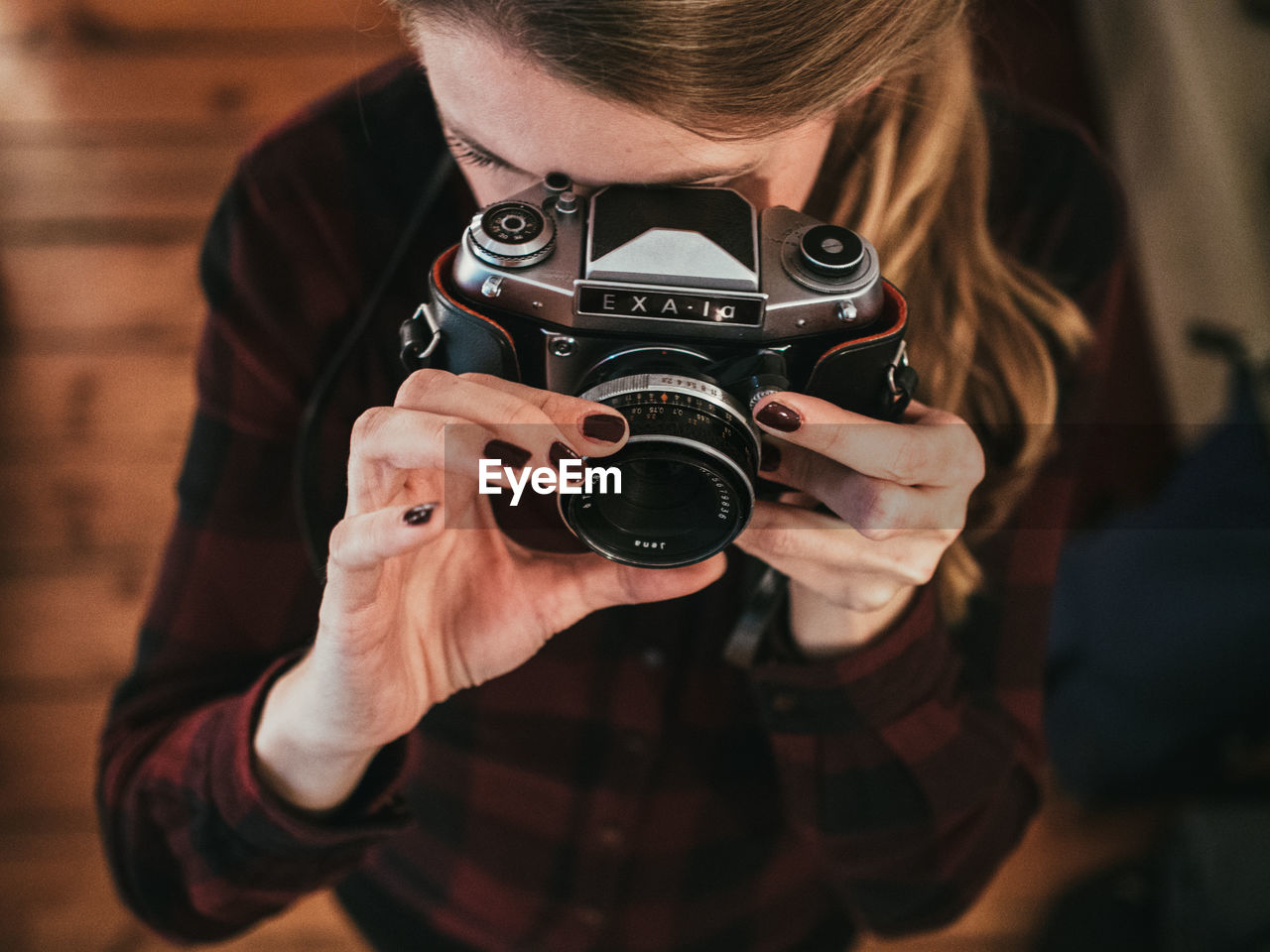 MIDSECTION OF MAN WEARING CAMERA