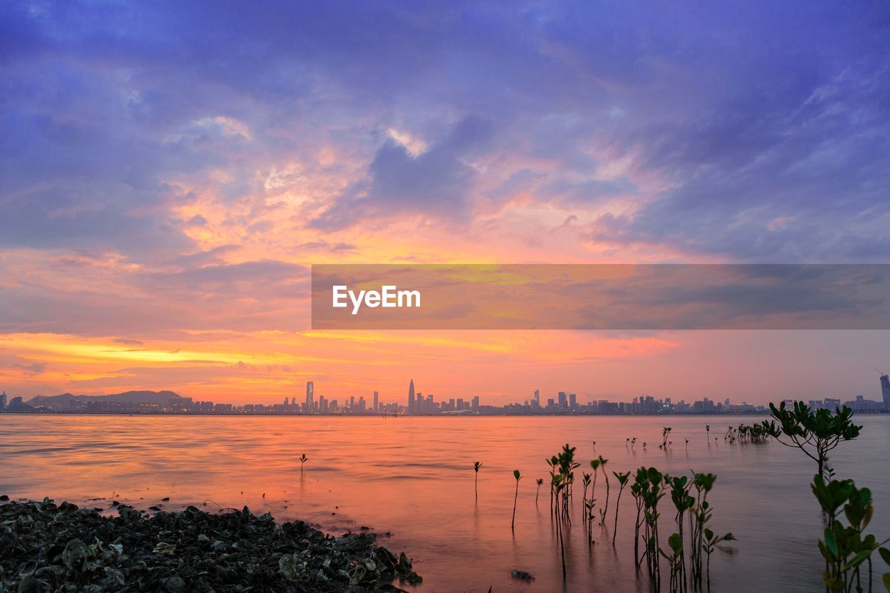 Scenic view of sea against sky during sunset