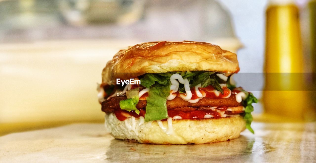 Close-up of burger on table