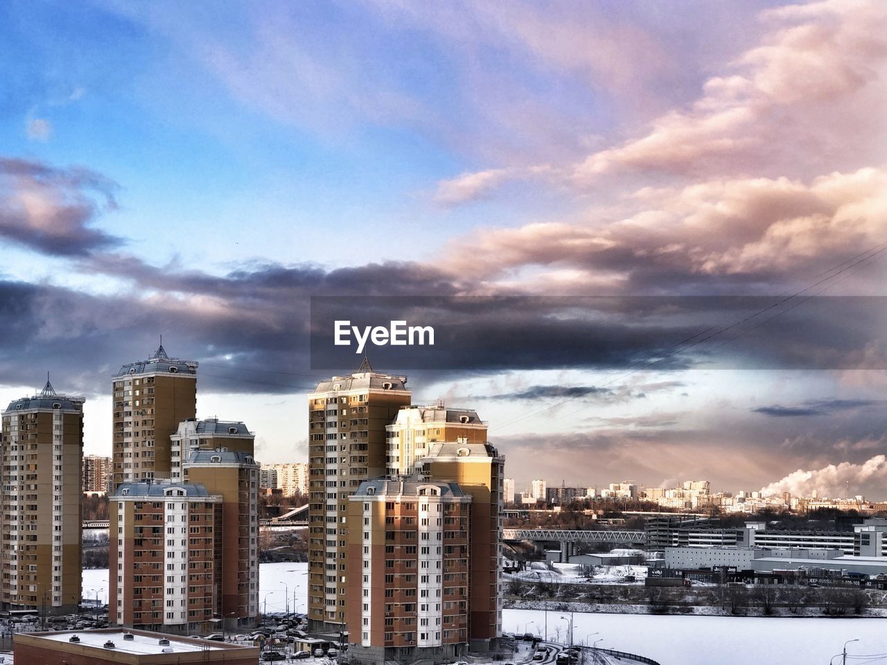 Modern buildings in city against sky