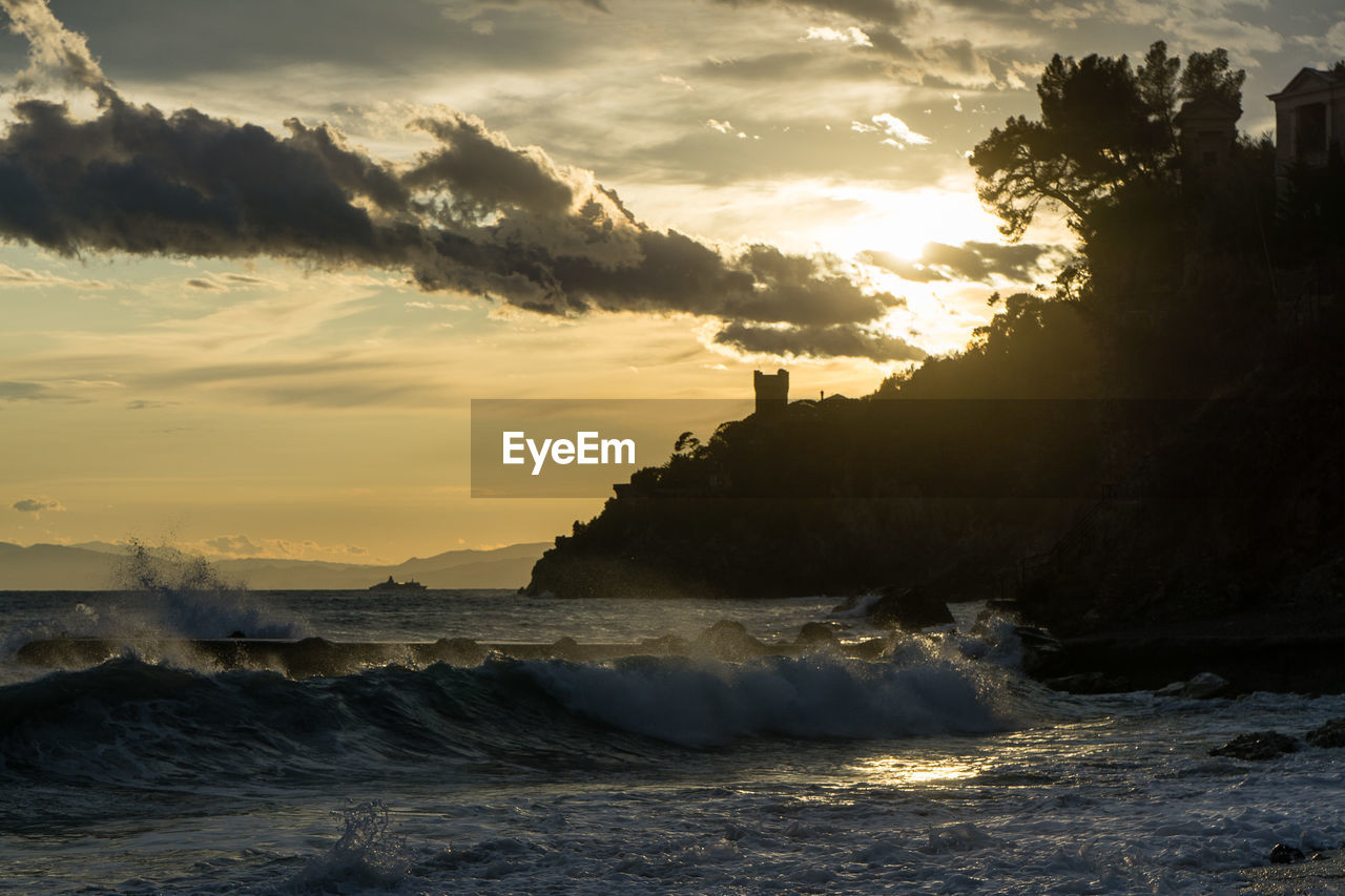 Scenic view of sea against sky during sunset