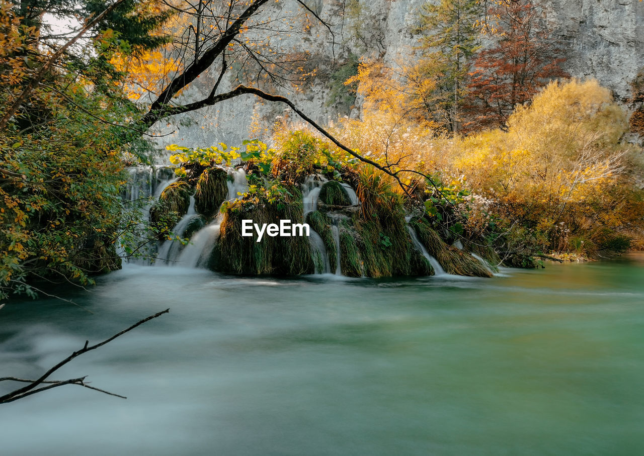 Long exposure photo of amazing waterfalls and cascades in autumn