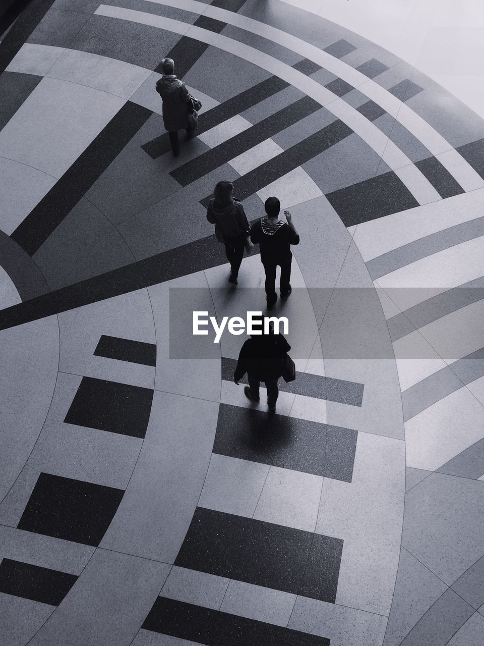 High angle view of people walking in shopping mall