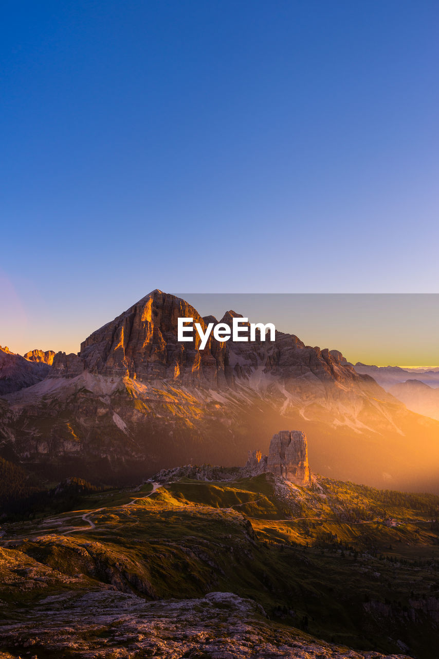 Rocky mountains against sky during sunset