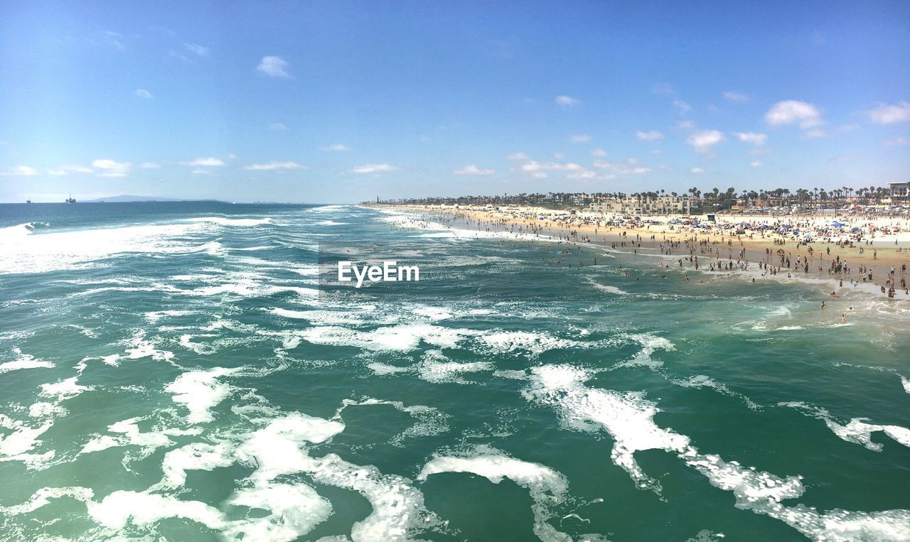 Scenic view of sea against blue sky