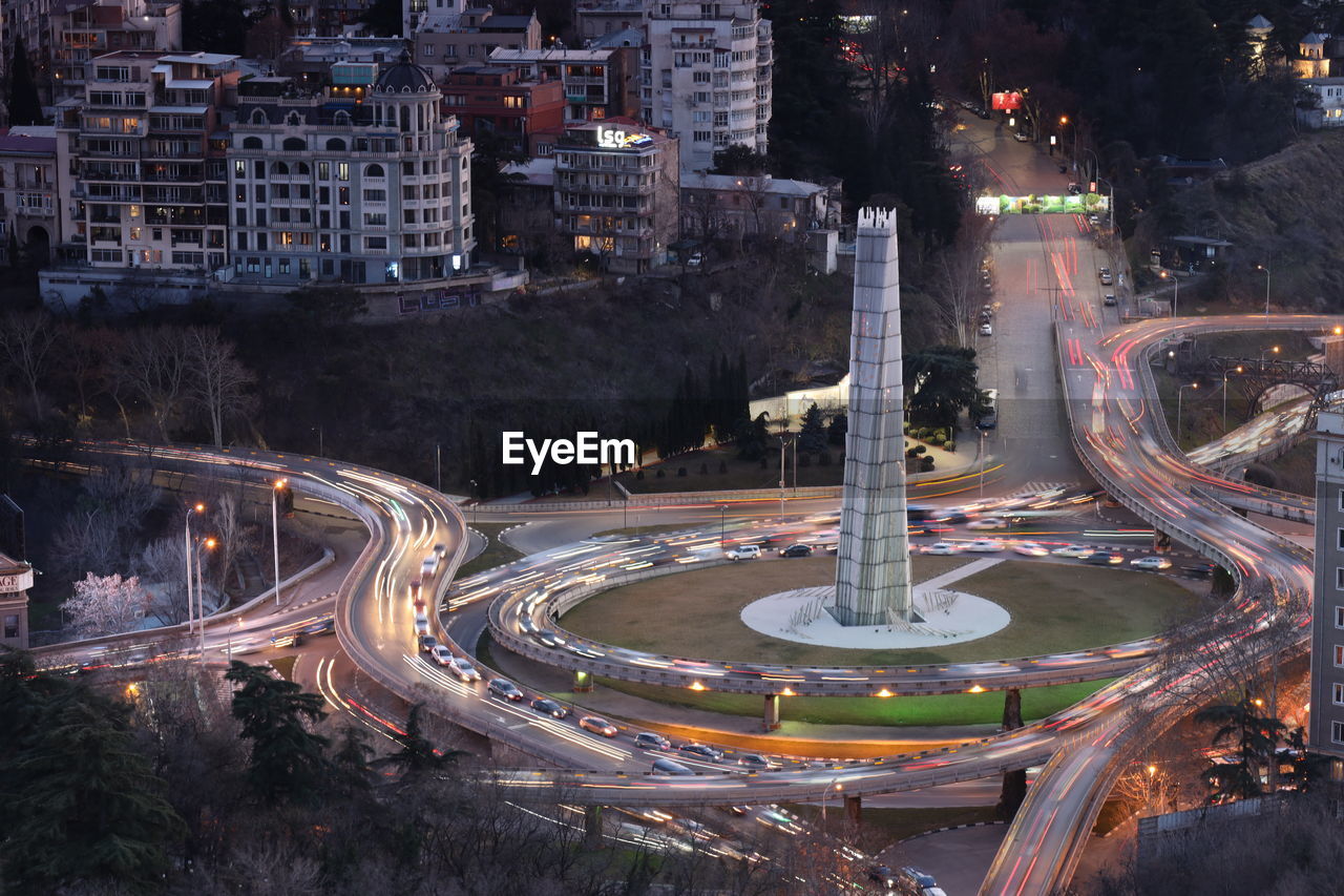 High angle view of illuminated buildings in city at night- tbilisi , georgia