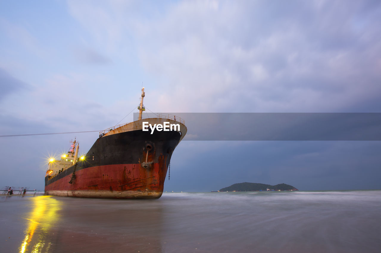 SHIP AT SEA AGAINST SKY