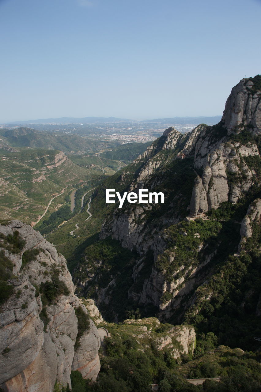 Scenic view of mountains against clear sky