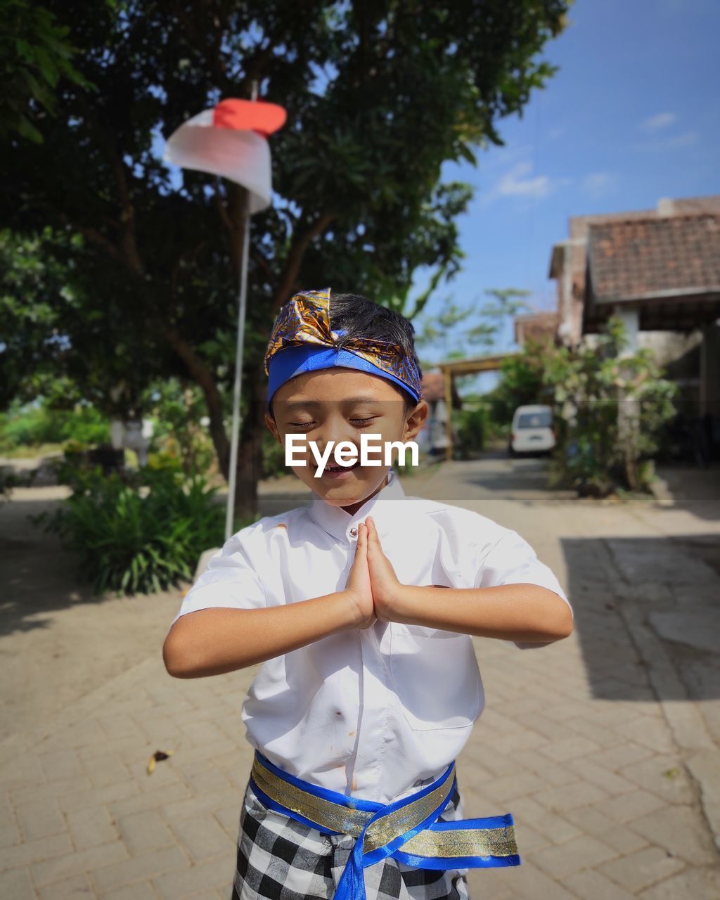 Posing in traditional balinese clothes to celebrate indonesia's independence day